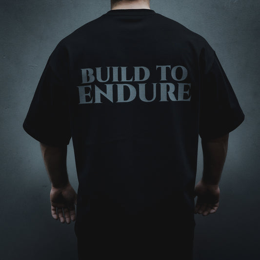 VYRYS Founders Oversized Premium T-Shirt 280gsm in Schwarz – Logo Front, Built to Endure Backprint color:black pos:front
