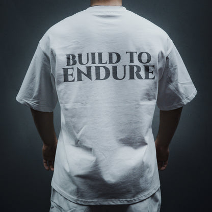 VVYRYS Founders Oversized Premium T-Shirt 280gsm in weiss – Logo Front, Built to Endure Backprint color:white pos: back